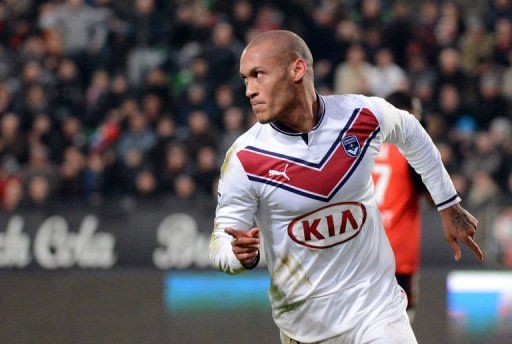 Bordeaux&#039;s forward Yoan Gouffran celebrates scoring on January 12, 2013, in Rennes, western France