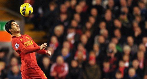 Liverpool&#039;s Luis Suarez controls the ball during their match against Sunderland, in Liverpool, on January 2, 2013