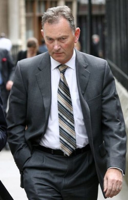 Premier League Chief Executive Richard Scudamore leaves London's High Court on July 13, 2007