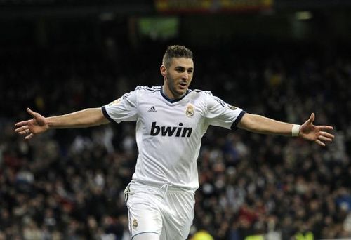 Real Madrid's Karim Benzema celebrates after scoring at the Santiago Bernabeu Stadium in Madrid on January 15, 2012