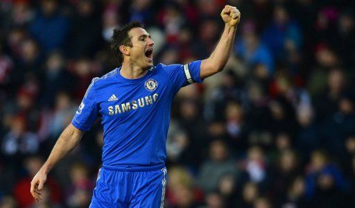 Chelsea midfielder Frank Lampard celebrates his side&#039;s second goal against Stoke City on January 12, 2013