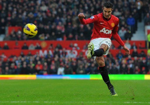 Robin van Persie takes the free-kick that led to United&#039;s second goal against Liverpool on January 13, 2013
