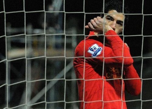 Suarez celebrates a goal during an FA Cup match against Mansfield Town on January 6, 2013