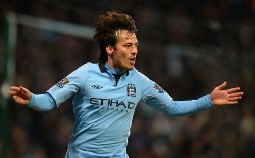 Manchester City's midfielder David Silva celebrates after scoring in Manchester on January 19, 2013