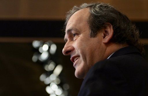 Michel Platini smiles on December 20, 2012 at the UEFA headquarters in Nyon