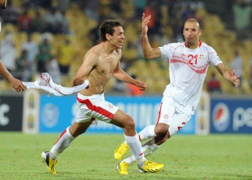 Tunisia&#039;s Youssef Msakni celebrates after scoring in Rustenburg on January 22, 2013