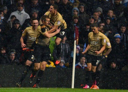 Bradford City&#039;s James Hanson (2nd L) celebrates after scoring at Villa Park, Birmingham, England on January 22, 2013