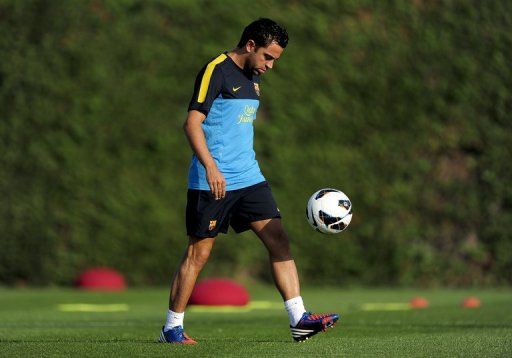 Xavi Hernandez attends a training session on August 14, 2012 at the Sports Center FC Bacelona Joan Gamper