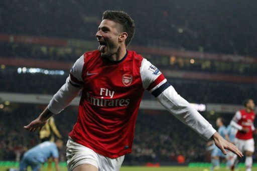 Arsenal&#039;s Olivier Giroud celebrates scoring in London on January 23, 2013