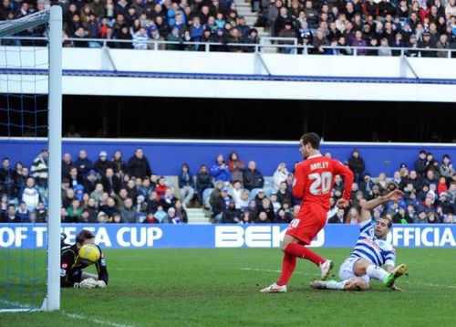 MK Dons' Ryan Harley scores against Queens Park Rangers on January 26, 2013