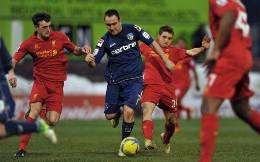 Oldham Athletic&#039;s Lee Croft (C) runs with the ball at Boundary Park, Oldham, on January 27, 2013