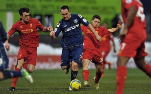 Oldham Athletic's Lee Croft (C) runs with the ball at Boundary Park, Oldham, on January 27, 2013