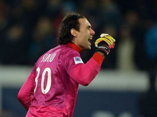 Paris Saint-Germain&#039;s Salvatore Sirigu celebrates after winning on January 27, 2013 at the Parc-des-Princes stadium