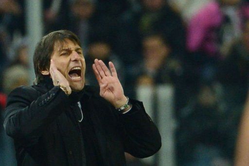 Juventus&#039; coach Antonio Conte reacts at the 