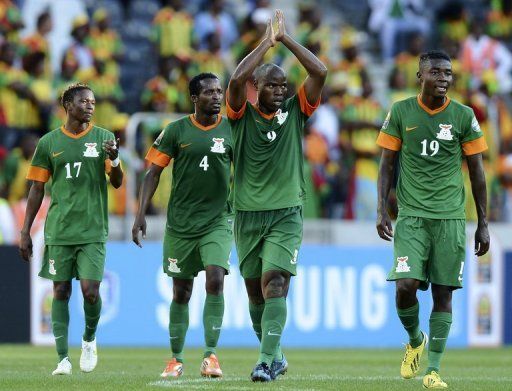 Zambia&#039;s Collins Mbesum (2nd R) celebrates after scoring a goal against Ethiopia on January 21, 2013