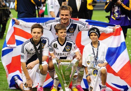 David Beckham with sons Brooklyn (left), Cruz and Romeo in Carson, California, on December 1, 2012