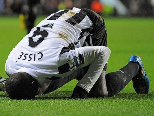 Newcastle United&#039;s Papiss Cisse celebrates after scoring in Birmingham on January 29, 2013