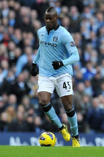 Manchester City striker Mario Balotelli in action against Manchester United on December 9, 2012