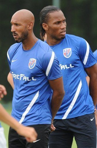 Didier Drogba (R) and Nicolas Anelka training for Shanghai Shenhua on July 16, 2012