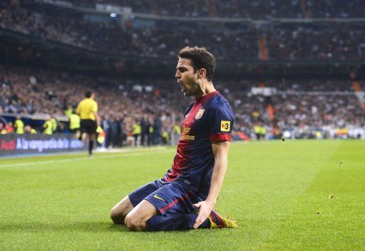 Barcelona&#039;s Cesc Fabregas celebrates after scoring in Madrid on January 30, 2013