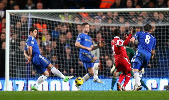 haun Wright Phillips of Queens Park Rangers scores the opening goal during the Barclays Premier League match between Chelsea and Queens Park Rangers at Stamford Bridge