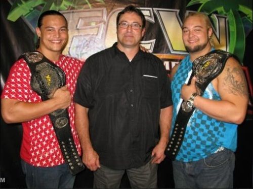 Bo Dallas(L) with his father &#039;IRS&#039; Mike Rotunda(C) and brother Bray Wyatt 