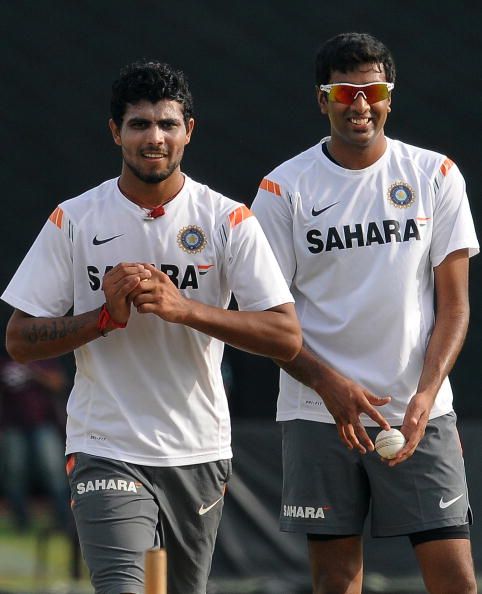 Indian cricketers Ravindra Jadeja (L) an