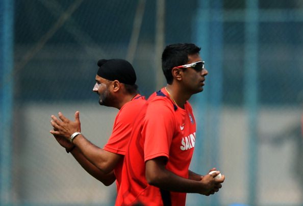 Indian cricketers Harbhajan Singh (L) an