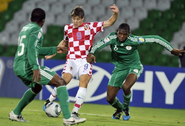 Croatia&Acirc;&acute;s Andrej Kramaric (C) is marked