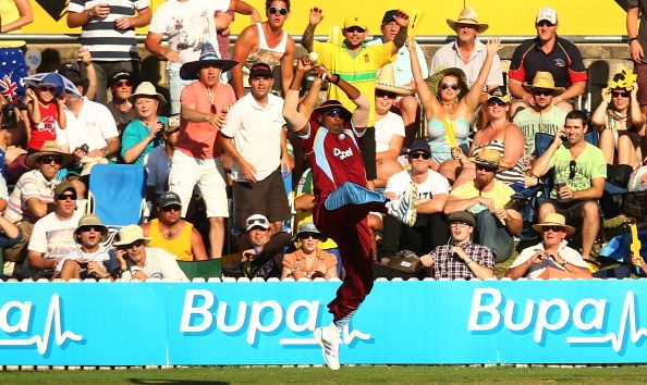 CANBERRA, AUSTRALIA - FEBRUARY 06:  Kieron Pollard of the West Indies takes a catch to dismiss George Bailey of Australia during the Commonwealth Bank One Day International Series between Australia and the West Indies at Manuka Oval on February 6, 2013 in Canberra, Australia.  (Photo by Mark Nolan/Getty Images)