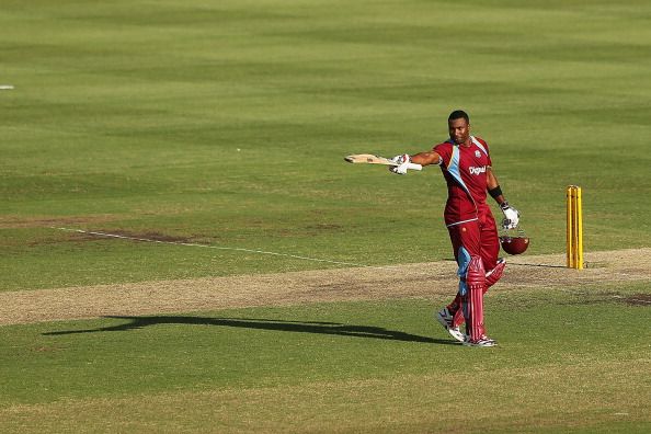 SYDNEY, AUSTRALIA - FEBRUARY 08:  Kieron Pollard of West Indies celebrates scoring his century during game four of the Commonwealth Bank One Day International Series between Australia and the West Indies at Sydney Cricket Ground on February 8, 2013 in Sydney, Australia.  (Photo by Brendon Thorne/Getty Images)