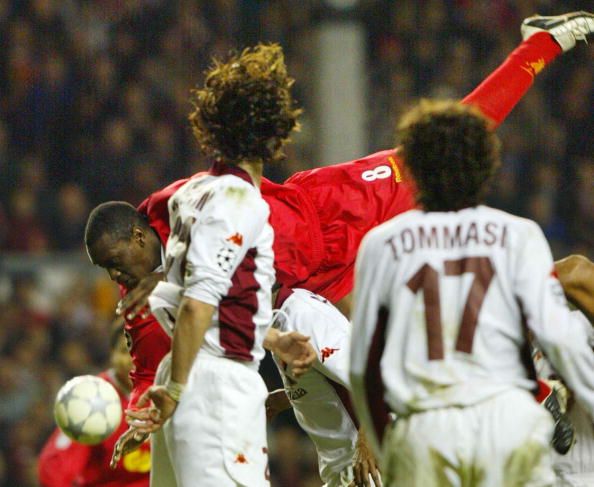 Liverpool&#039;s Emile Heskey goes horizontal trying to