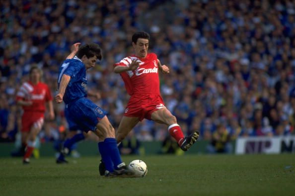 Ian Rush of Liverpool and Warren Neill of Portsmouth