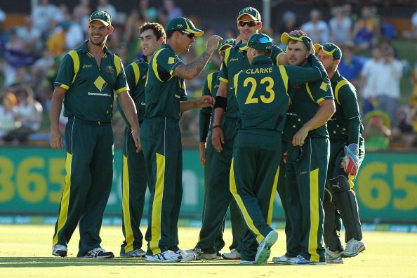 PERTH, AUSTRALIA - FEBRUARY 03: Aaron Finch of Australia is congratulated after taking a catch off Kieron Pollard of the West Indies during game two of the Commonwealth Bank One Day International Series 