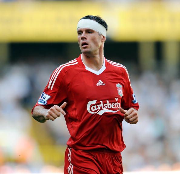LONDON, ENGLAND - AUGUST 16:  (THE SUN OUT)  Jamie Carragher of Liverpool wears a bandage around his head after clashing heads with teammate Martin Skrtel whilst going up for a header during the Barclays Premier league match between Tottenham Hotspur and Liverpool at White Hart Lane on August 16, 2009 in London, England. 