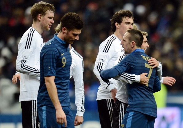 France&#039;s forward Franck Ribery (R) congratulates Germany&#039;s defender and captain Philipp Lahm after a friendly international football match between France and Germany on February 6, 2013