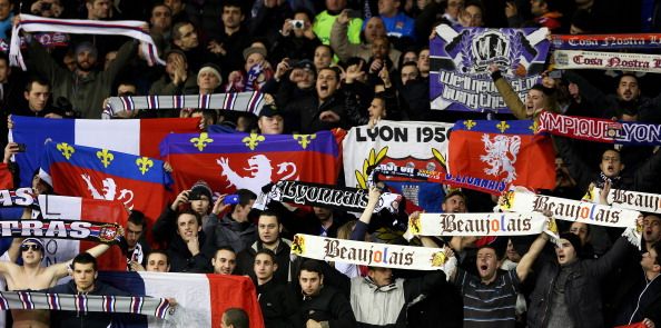 LONDON, ENGLAND - FEBRUARY 14:  Olympique Lyonnais fans cheer on their team 