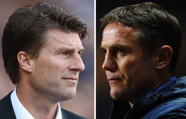 Swansea manager Michael Laudrup (L) and Bradford manager Phil Parkinson. 