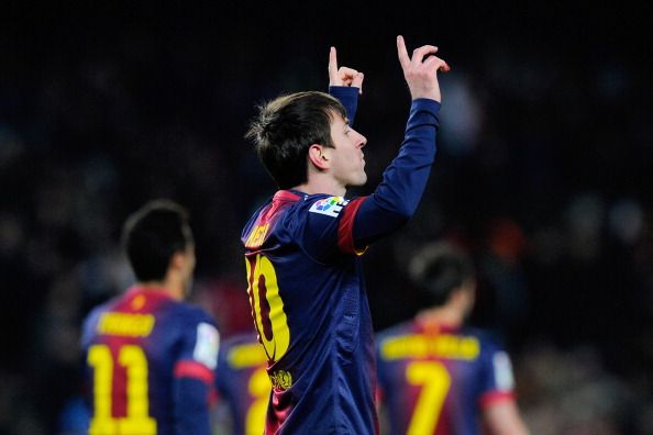 :  Lionel Messi of FC Barcelona celebrates after scoring his team&#039;s second goal during the La Liga match between FC Barcelona and Sevilla FC