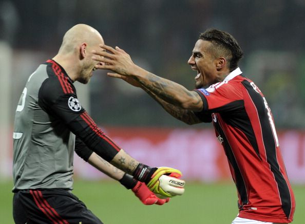 MILAN, ITALY - FEBRUARY 20:  Kevin Prince Boateng and Cristian Abbiati (L) of AC Milan celebrate victory at the end of the UEFA Champions League Round of 16 first leg match between AC Milan and Barcelona 