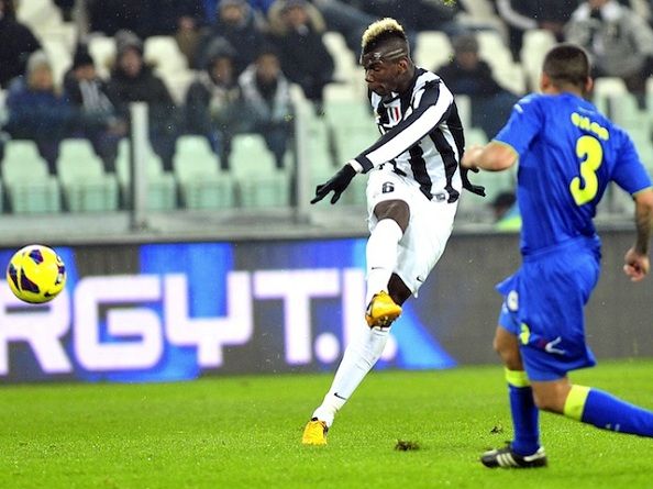 Juventus&#039; Paul Pogba fires a shot and scores during a Serie A match between Juventus and Udinese at the Juventus Stadium in Turin, Italy.