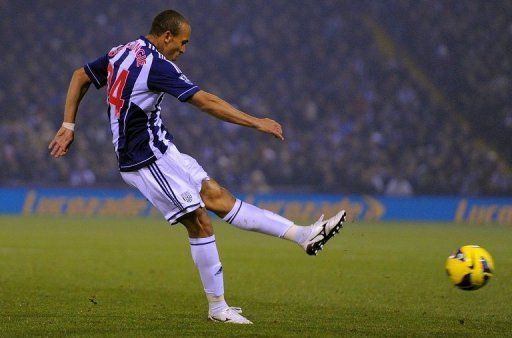 West Bromwich Albion&#039;s Peter Odemwingie shoots to score at The Hawthorns in West Bromwich on November 5, 2012