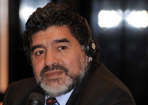 Argentinian football legend Diego Maradona holds a press conference in Dubai late on September 2, 2012