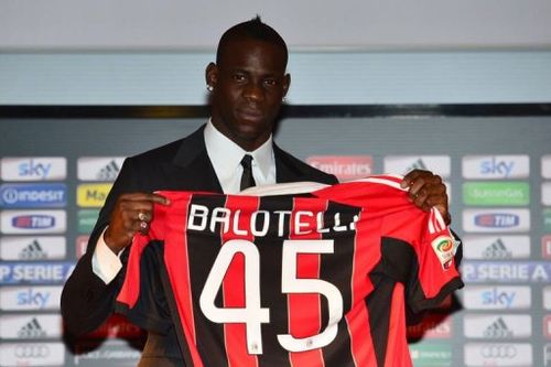 Mario Balotelli poses with his team jersey on February 1, 2013 at San Siro Stadium