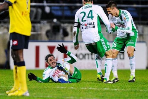 Saint-Etienne's midfielder Fabien Lemoine (L) celebrates after scoring in Montbeliard on February 2, 2013