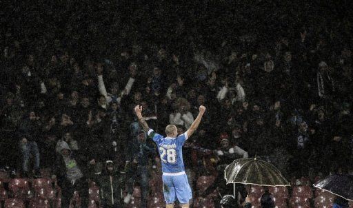 SSC Napoli&#039;s captain Paolo Cannavaro celebrates after scoring in Naples on February 2, 2013