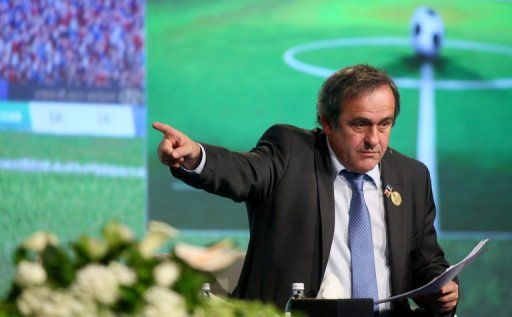 Michel Platini gives a speech in Dubai on December 28, 2012