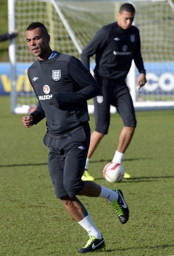 England footballer Ashley Cole takes part in a team training session on February 4, 2013
