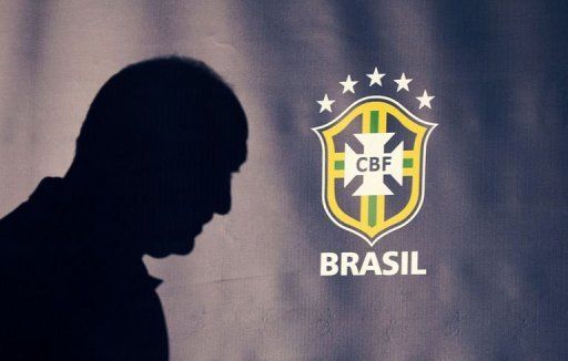 Brazil&#039;s coach Felipe Scolari arrives to hold his press conference at Wembley Stadium in London on February 5, 2013