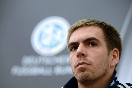 Philipp Lahm attends a press conference on February 5, 2013 at the Stade de France in Saint-Denis, near Paris